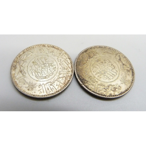 1069 - Two Saudi Arabia silver Riyal coins, 23.3g