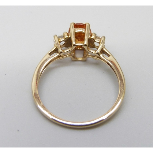 1071 - A 9ct gold fire opal and topaz ring, 1.7g, L