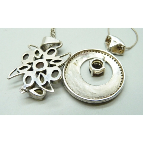 1084 - Two silver pendants and chains