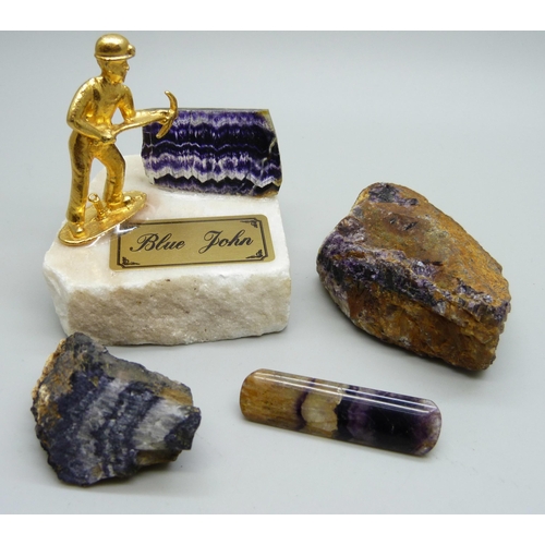 1101 - A Blue John brooch, (crack in the stone), two Blue John geological samples and Blue John in resin on... 