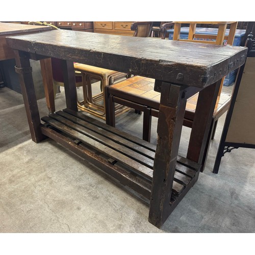 235 - A stained pine workbench