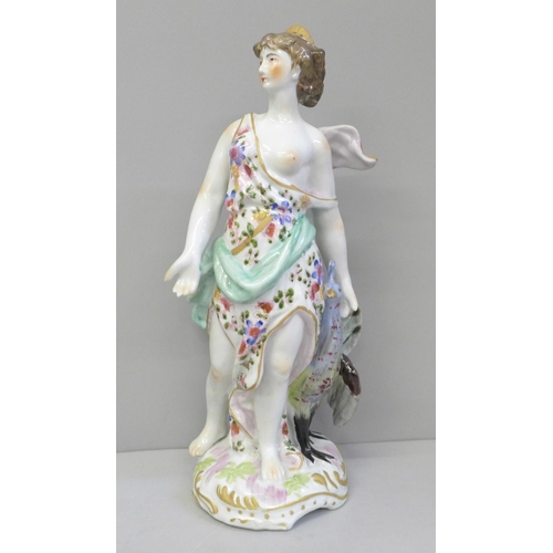 601 - A 19th Century porcelain figure of Juno and the Peacock, 26.5cm