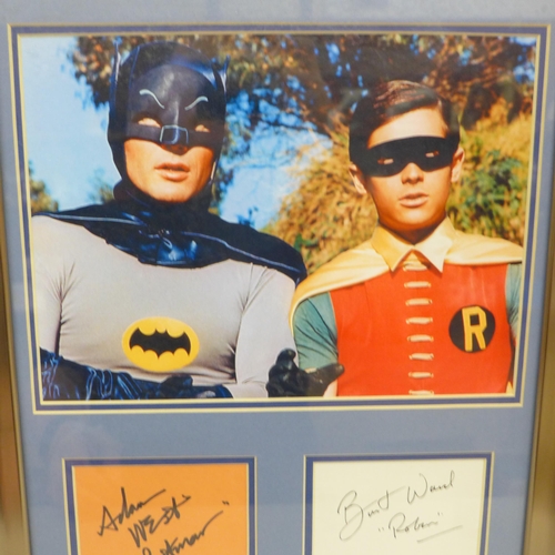 611 - A Batman and Robin display, signed by Adam West and Burt Ward, no COA