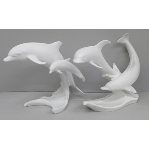 614 - Two Kaiser dolphin figure groups