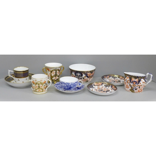 617 - A collection of Royal Crown Derby china including two cups and saucers, bowl, cream, two other sauce... 