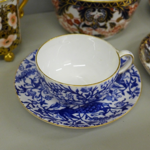 617 - A collection of Royal Crown Derby china including two cups and saucers, bowl, cream, two other sauce... 