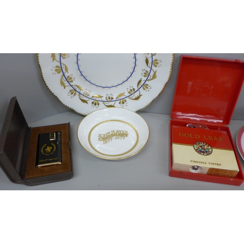 618 - A JPS John Player Special lighter, a Gold Leaf lighter, a Players plate and dish and a Sara Miller P... 