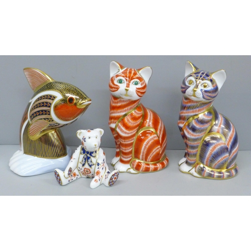 631 - Four Royal Crown Derby paperweights, two cat, one teddy bear and one Guppy tropical fish, one cat wi... 