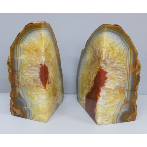 632 - A pair of geode paperweights, 17cm