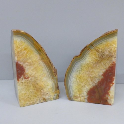 632 - A pair of geode paperweights, 17cm