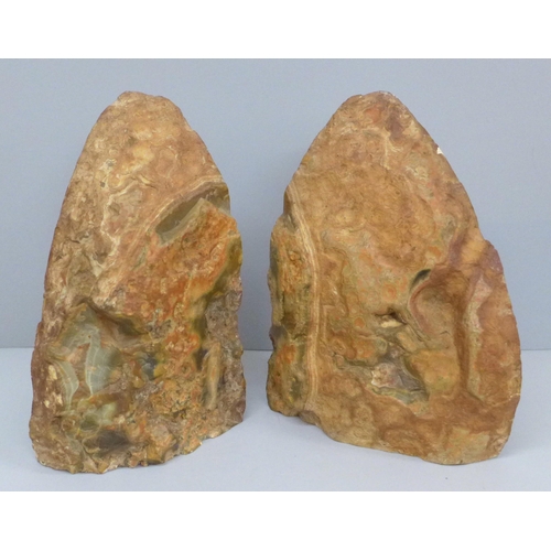 632 - A pair of geode paperweights, 17cm