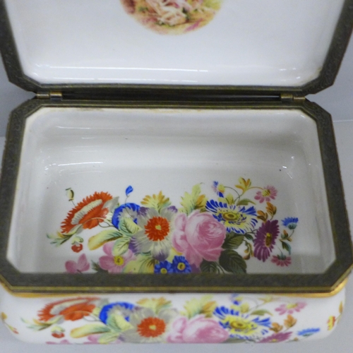 633 - A Meissen style porcelain box with gilt metal hinge, printed decoration of floral bouquets and class... 