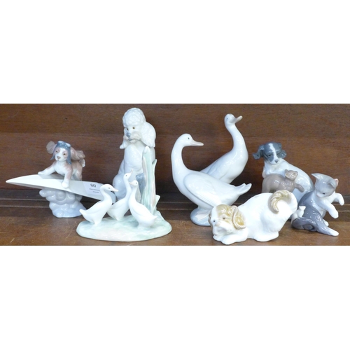 647 - Two Lladro figures and six Nao figures, two with small chips