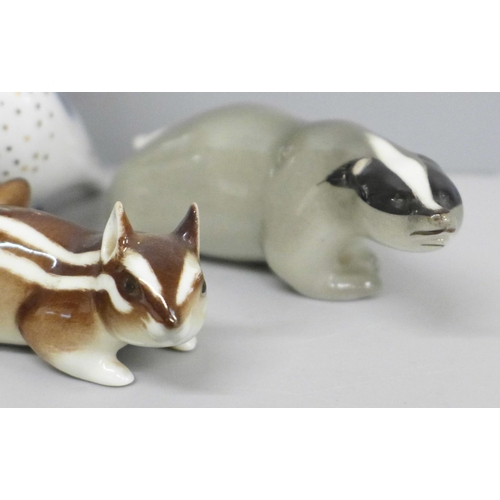 648 - A collection of USSR porcelain animal figures including chipmunks and badger