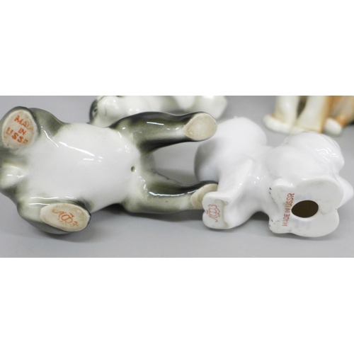 651 - A collection of USSR porcelain animal figures including racoon, bear, lion cub and panda