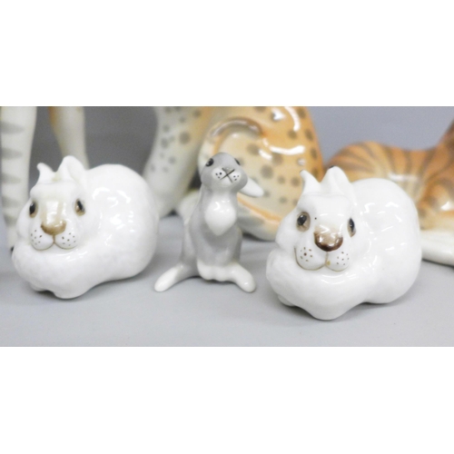 654 - A collection of nine USSR porcelain animal figures including giraffe calf, rabbits and zebra, one a/... 