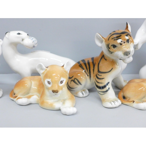 657 - A collection of six USSR porcelain animal figures including polar bear, tiger cub and lion cub, one ... 