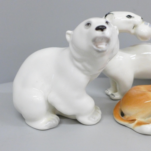 657 - A collection of six USSR porcelain animal figures including polar bear, tiger cub and lion cub, one ... 