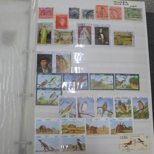 661 - Four albums of world stamps