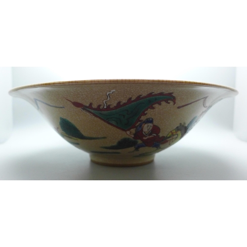 672 - A large early 20th Century Chinese crackle glaze bowl, 28cm diameter