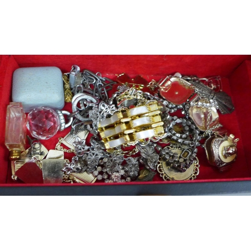 701 - Two boxes of jewellery including marcasite brooches, a Provincial Grand Lodge medal dated 1917, a WW... 