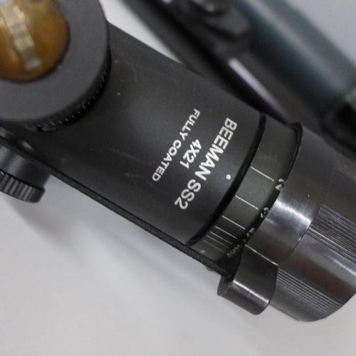 705 - A collection of rifle scopes including Tasco 4 x32, Beeman 552, 4 x 21, AGS 4 x 40, etc. (4)