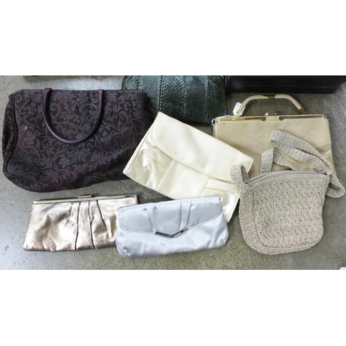 709 - A box of vintage handbags and clutch bags including Liberty shopping bag