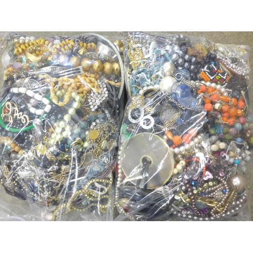 716 - Two bags of costume jewellery