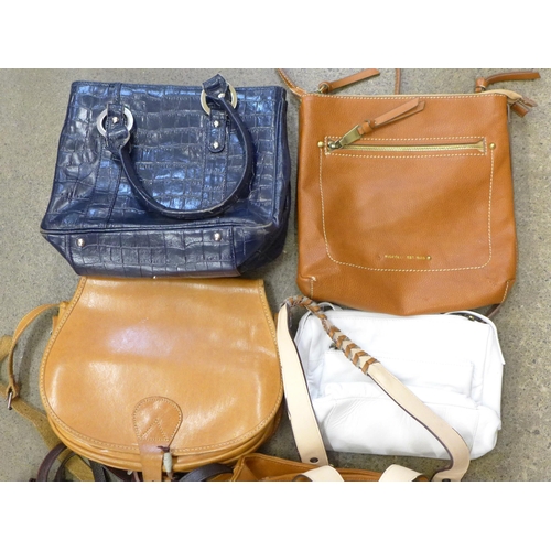 720 - A box of modern handbags, Osprey, Fiorelli, etc