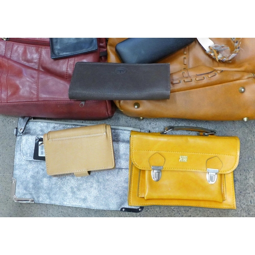 720 - A box of modern handbags, Osprey, Fiorelli, etc