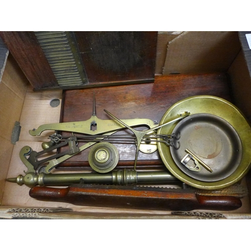 734 - A set of brass bankers scales on a wooden stand and a brass and wooden apothecary pill rolling machi... 