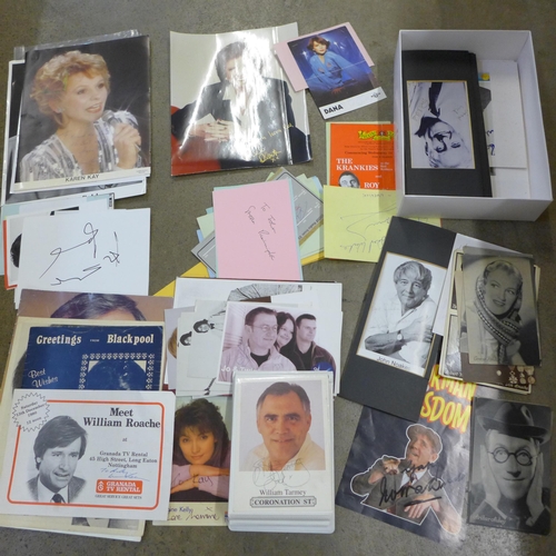 745 - A collection of signed celebrity photographs and pictures including Norman Wisdom, Richard Briers an... 