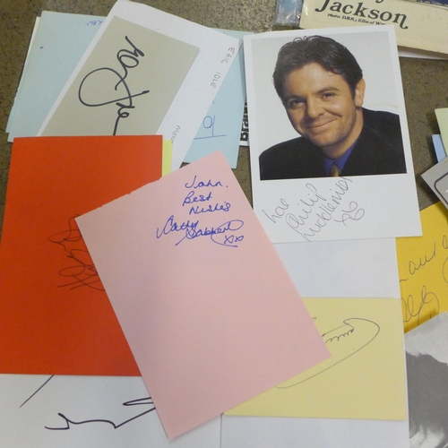 745 - A collection of signed celebrity photographs and pictures including Norman Wisdom, Richard Briers an... 