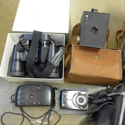 747 - A Nikai PDS System 35mm camera, a Samsung 34X optical 300m camcorder, a pair of Opticron 8x42 binocu... 