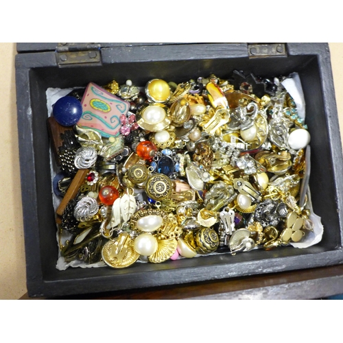 753 - A box of costume jewellery and a box of earrings