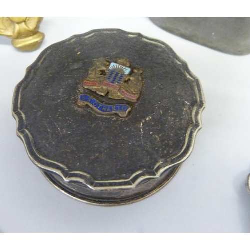 754 - A collection of items including military interest trinket box enamelled SS Outrando, clock and hip f... 