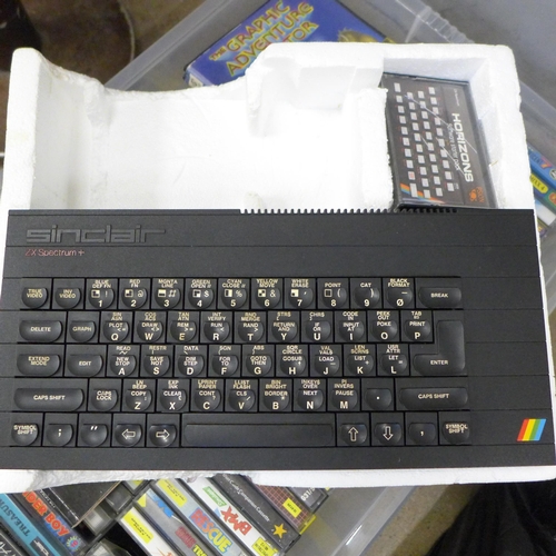 760 - A Sinclair ZX Spectrum, boxed but lacking tape recorder and a large collection of games **PLEASE NOT... 