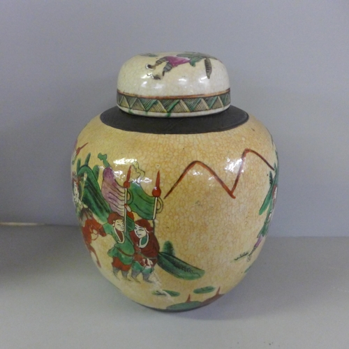 799 - A large 20th Century Chinese crackle glaze ginger jar with lid, 25cm