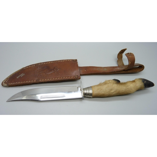 811 - A hunting knife with scabbard, the blade marked Olivetto, the scabbard marked San Marino