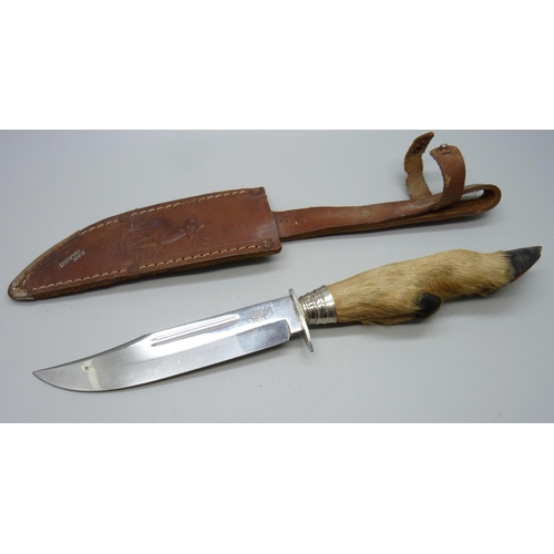 811 - A hunting knife with scabbard, the blade marked Olivetto, the scabbard marked San Marino