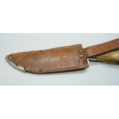 811 - A hunting knife with scabbard, the blade marked Olivetto, the scabbard marked San Marino