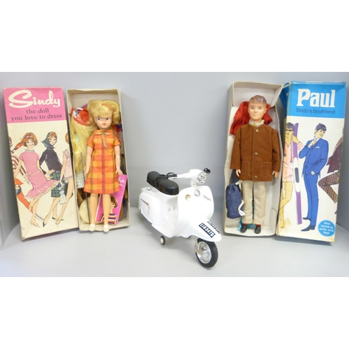 818 - A Sindy doll, a Paul doll and a Pedigree Paul's scooter, boxed