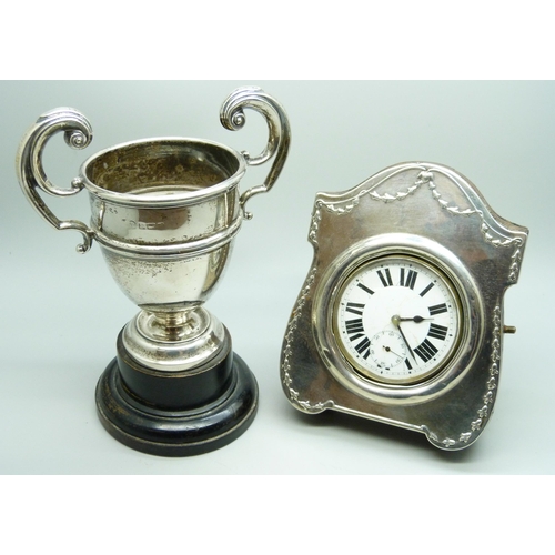 867 - A silver trophy and a silver fronted clock/watch case, with Goliath pocket watch, trophy 97g