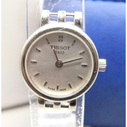 869 - A lady's Tissot wristwatch head and a Tissot box