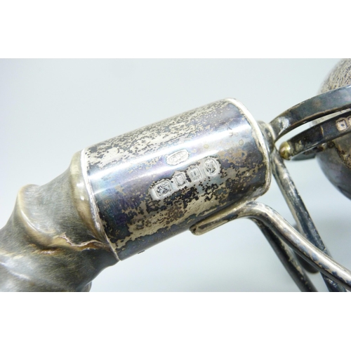 870 - A silver desk lighter/warmer with antler handle, hallmarked London 1935