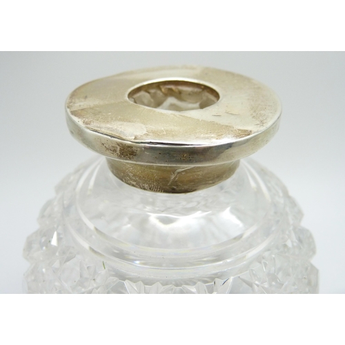 871 - A silver mounted globular glass scent bottle