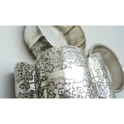 876 - Four silver napkin rings, 107g