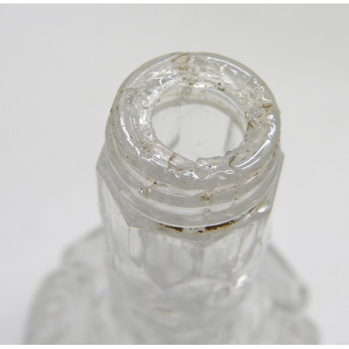 895 - A Victorian silver topped glass jar and two silver topped oil bottles