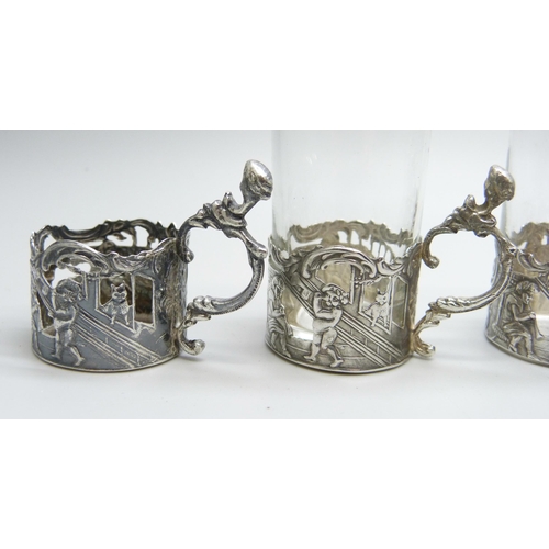 896 - Six Victorian silver glass shot holders, import mark for London 1890, with four glasses