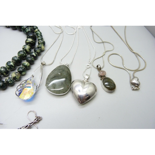 900 - A collection of silver jewellery, etc., including a hallmarked silver ring set with moss agate, size... 